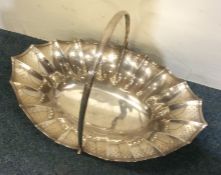 A good Georgian silver boat shaped basket with cre