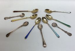 A set of six silver and enamelled teaspoons togeth