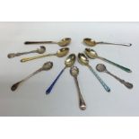 A set of six silver and enamelled teaspoons togeth