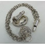 An unusual Victorian silver wall mounted whistle w
