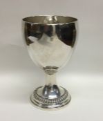 A Georgian silver goblet of slender form with gadr