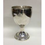 A Georgian silver goblet of slender form with gadr