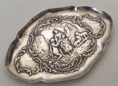 An attractive oval silver sweet dish decorated wit