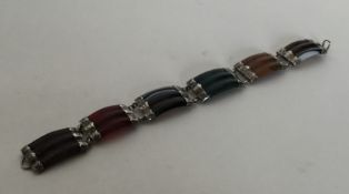 A banded agate and silver Scottish bracelet with e