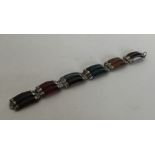 A banded agate and silver Scottish bracelet with e