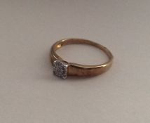 A 9 carat circular diamond cluster ring. Approx. 2
