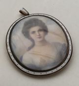 An attractive oval gold miniature depicting a in e