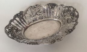 A Continental silver bonbon dish decorated with fl