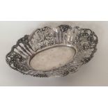 A Continental silver bonbon dish decorated with fl