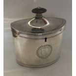 A good George III boat shaped silver tea caddy wit