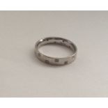 A 9 carat half eternity ring. Approx. 4 grams. Est