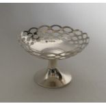 A circular silver pierced sweet dish. Birmingham.