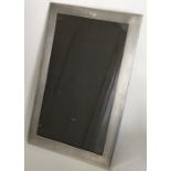 A good quality large engine turned picture frame.