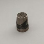 An unusual Iraqi silver and Niello thimble. Approx
