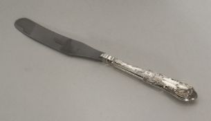 A Kings' pattern silver butter knife with steel bl