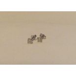 A pair of attractive diamond single stone ear stud