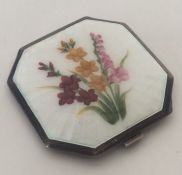 An attractive lady's silver and enamel compact dec