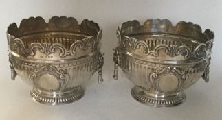 An attractive pair of Edwardian silver rose bowls