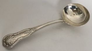 EXETER: A Kings' pattern silver sauce ladle. By JW