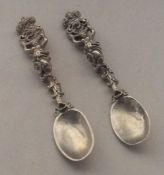 A pair of heavy Continental silver cast salt spoon