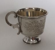 A Russian silver cup on spreading base. Marked to
