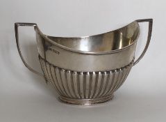 A half fluted silver sugar bowl. Sheffield. By R&B