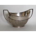 A half fluted silver sugar bowl. Sheffield. By R&B