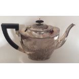 A large Edwardian silver half fluted teapot. Birmi