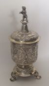 A large Continental silver cup and cover with gilt