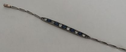 An Antique silver and paste bracelet with conceale