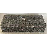 A large silver embossed jewellery case decorated w