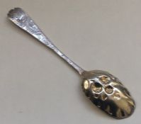 An 18th Century silver trefid berry spoon with flo