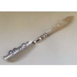 An Edwardian silver engraved butter knife with MOP