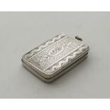 A large silver vinaigrette with gilt interior and