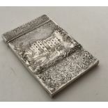 An unusual double sided silver card case