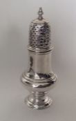 A good Georgian silver baluster shaped caster with