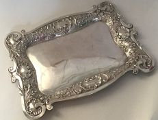 A heavy decorated silver dressing table tray. Birm
