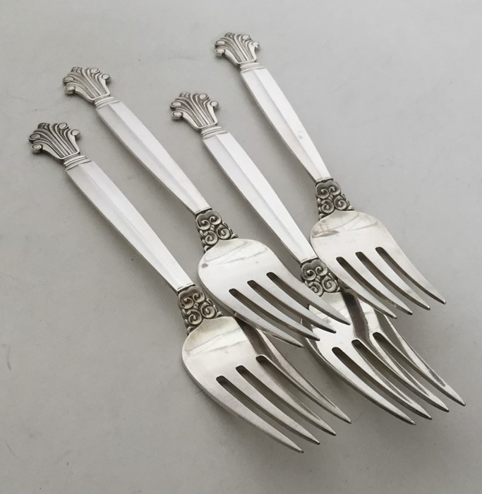 GEORG JENSEN: A heavy set of four tapering silver