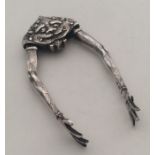 A rare pair of Victorian silver sugar tongs in the