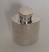 An Edwardian silver oval tea caddy. Sheffield. By