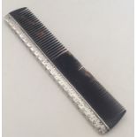 LIBERTY & CO: A tortoiseshell mounted comb with te