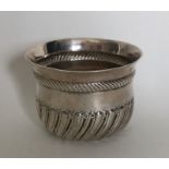 An Edwardian silver half fluted sugar bowl. London