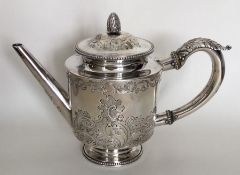 An attractive George III silver teapot crisply engr
