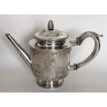 An attractive George III silver teapot crisply engr