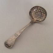 A Kings' pattern silver sifter spoon. London. By S