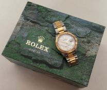 ROLEX: A gent's bi-metal Oyster DateJust wristwatc