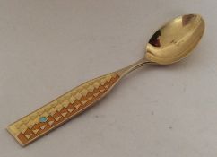 A stylish silver and silver gilt Dutch spoon with