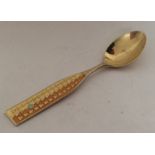 A stylish silver and silver gilt Dutch spoon with