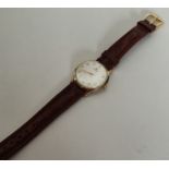 A gent's 9 carat Tissot wristwatch with silvered d