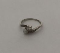 A diamond and pearl two stone crossover ring set i